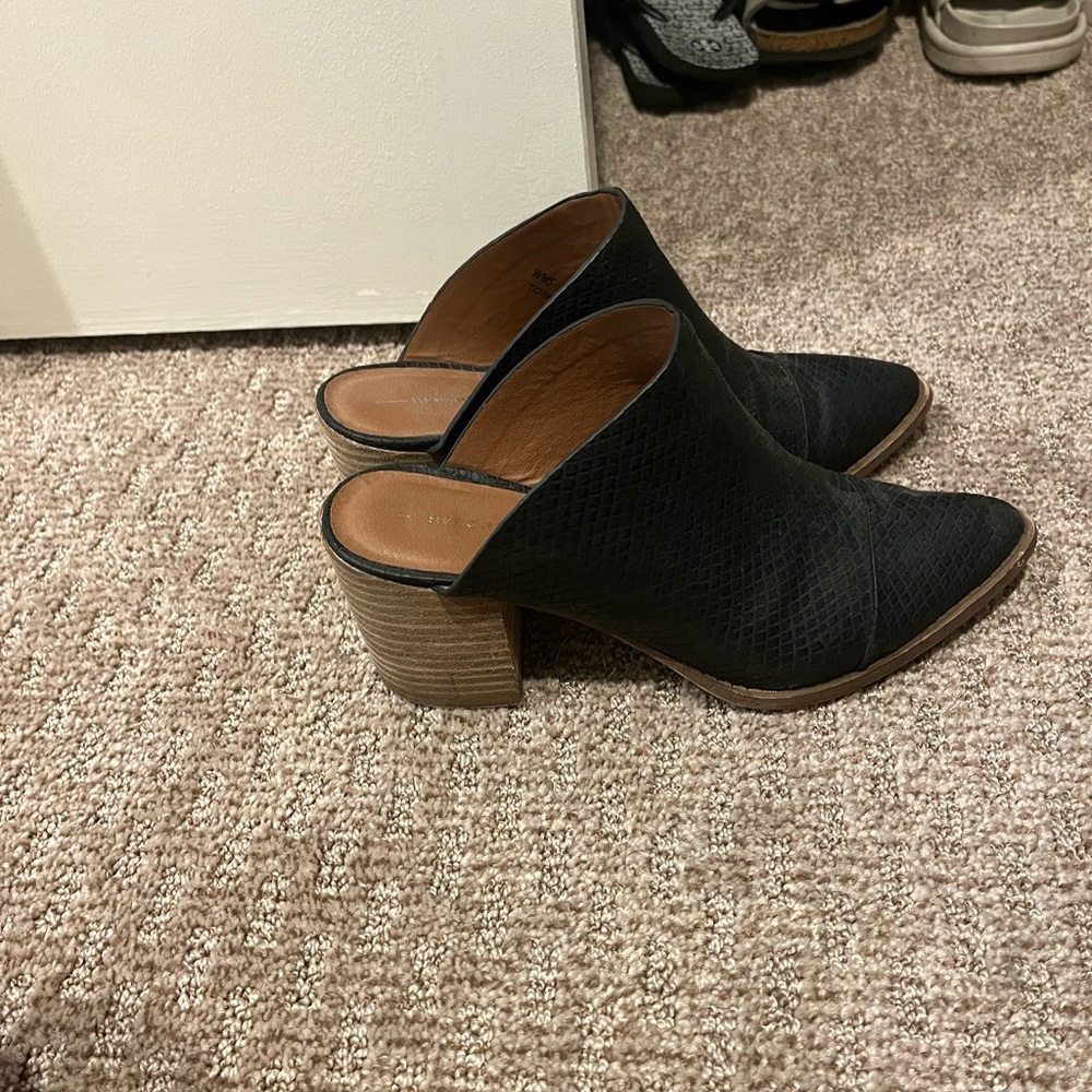 Black mules with wooden heel